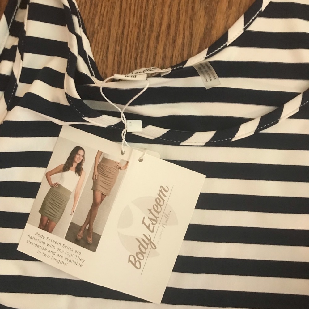 Beautiful slimming shirt never worn